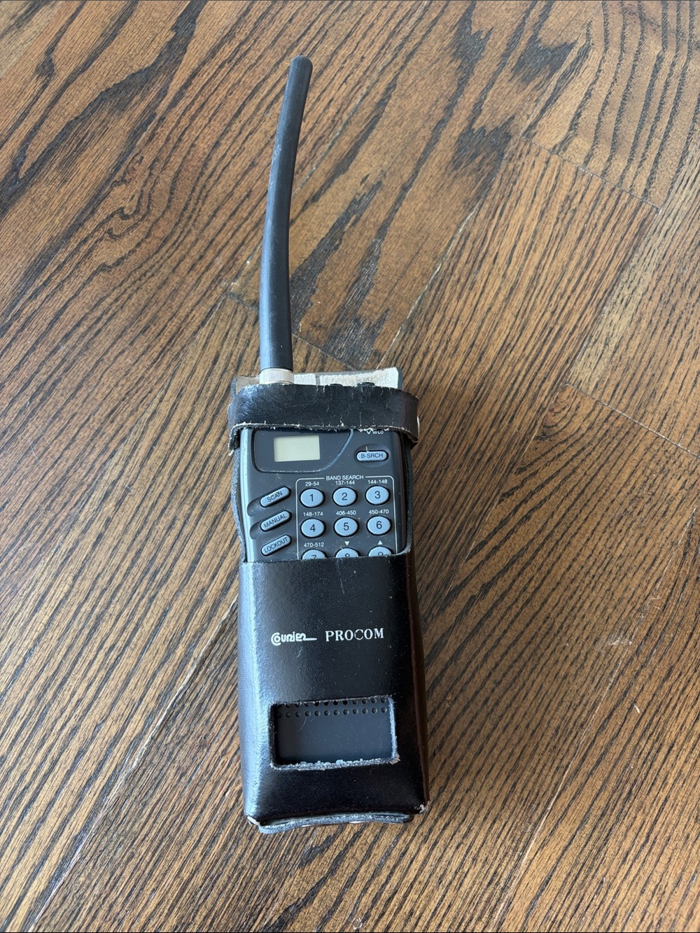 Vintage Uniden PROCOM leather case with Radio Shack handheld Radio Scanner